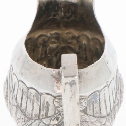 Roomkannetje zilver.