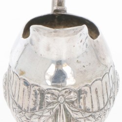 Roomkannetje zilver.