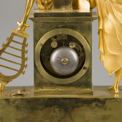 Een vuurvergulde Charles X schouwpendule met voorstelling van Orpheus, Frankrijk, ca. 1830.