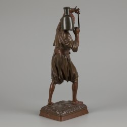 Louis-Auguste Hiolin (1846 - 1910), Een bronzen sculptuur van een waterdrager - Aguador, eind 19e eeuw.