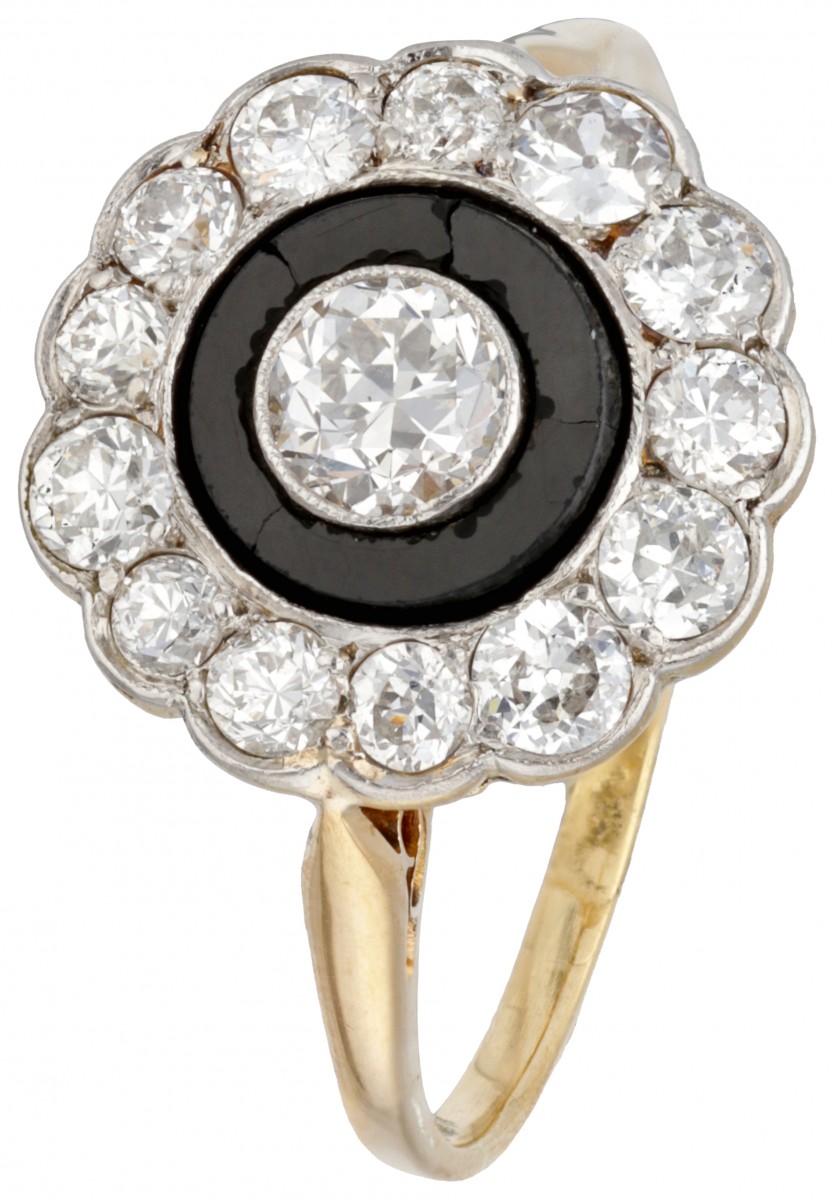 18 kt. Bicolor gouden art deco target ring bezet met ca. 1.16 ct. diamant en onyx.