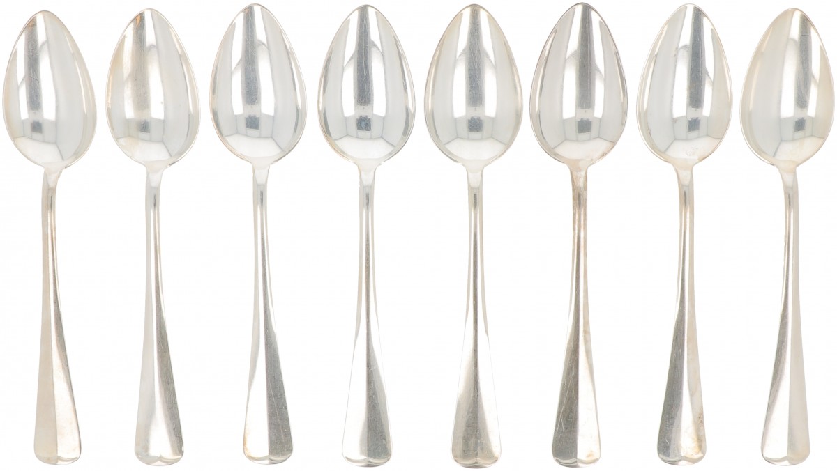 (8) delige set dinerlepels "Haags Lofje" zilver.