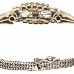 14 kt. Bicolor gouden ajour / opengewerkte art deco armband bezet met ca. 0.72 ct. diamant.