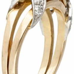 18 kt. Bicolor gouden art deco ring bezet met ca. 0.84 ct. diamant.