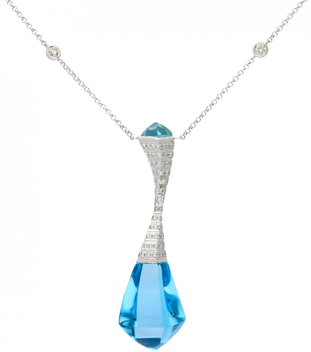 18 kt. Witgouden collier en hanger bezet met ca. 0.36 ct. diamant en blauwe topaas.