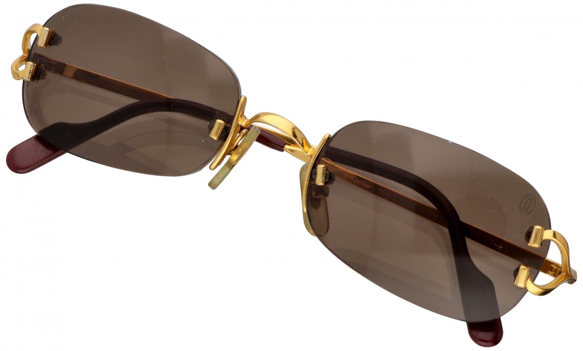 18 kt. Goud vergulde Cartier 'C Decor' randloze vintage zonnebril met bruine glazen.