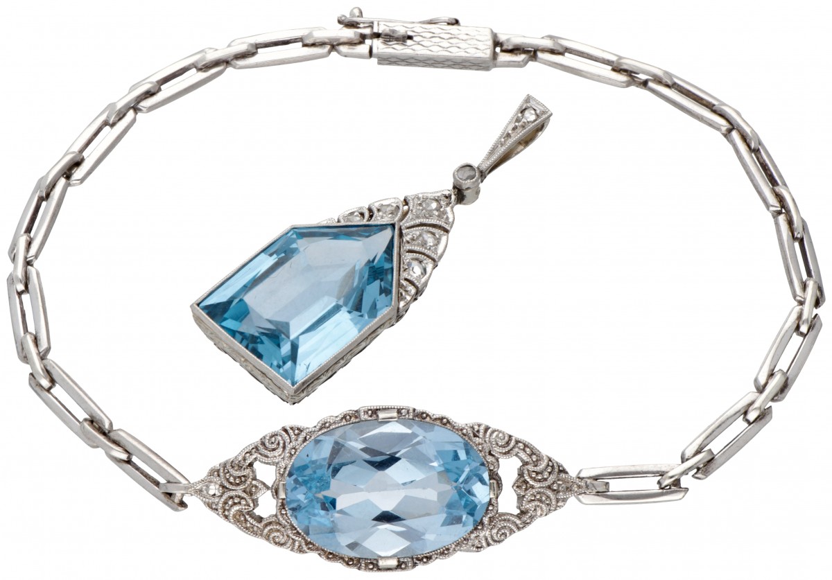 Set van sterling zilveren art deco armband en hanger bezet met synthetische spinel en diamant.