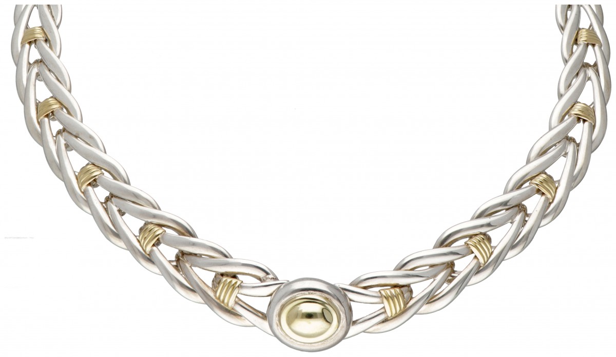 Sterling zilveren Christofle schakelcollier met 18 kt. geelgouden details.