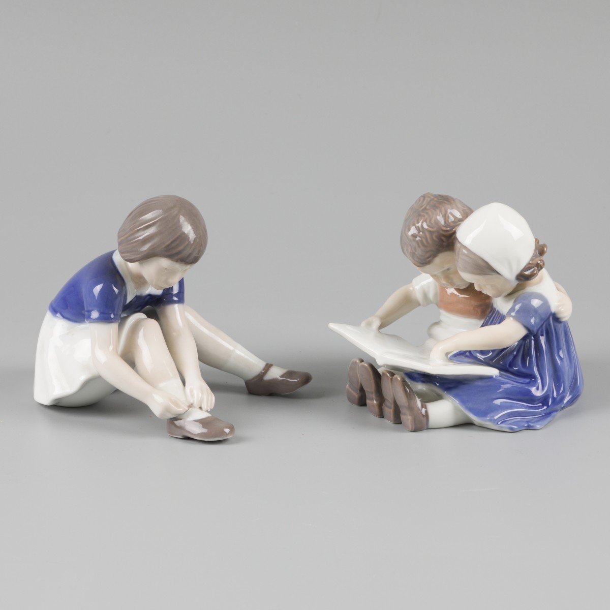 Een lot bestaande uit (2) figuurstukken, Royal Copenhagen, Denemarken, 20e eeuw.