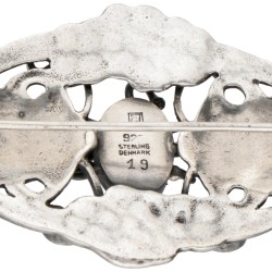 Vroege sterling zilveren no.19 broche met barnsteen door Deense designer Georg Jensen.