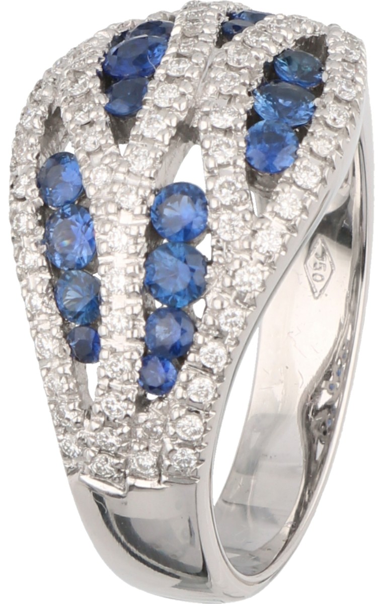 18 kt. Witgouden ring bezet met ca. 0.39 ct. diamant en saffier.