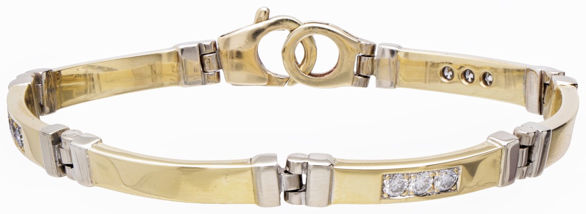 14 kt. Bicolor gouden armband bezet met ca. 0.72 ct. diamant.