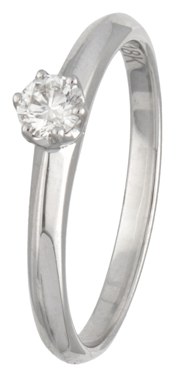 18 kt. Witgouden solitair ring bezet met ca. 0.19 ct. diamant.