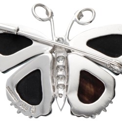 14K. White gold butterfly brooch set with approx. 0.50 ct. diamond and opal doublet.