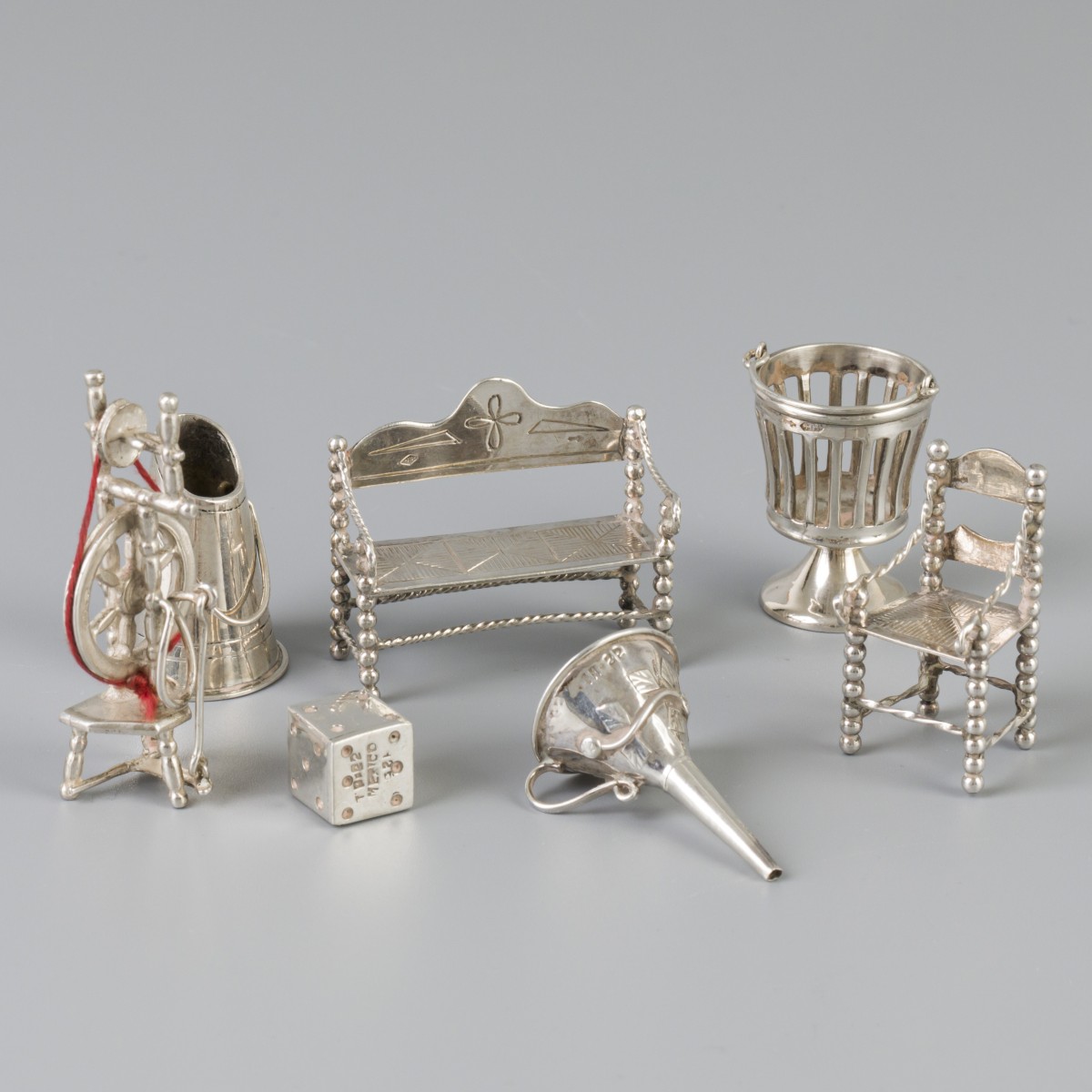 7-delig lot miniaturen zilver.