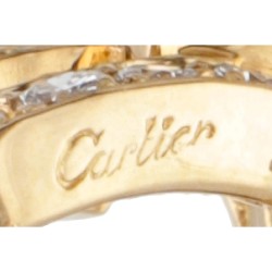 Cartier 18 kt. geelgouden oorbellen bezet met ca. 0.42 ct. diamant.