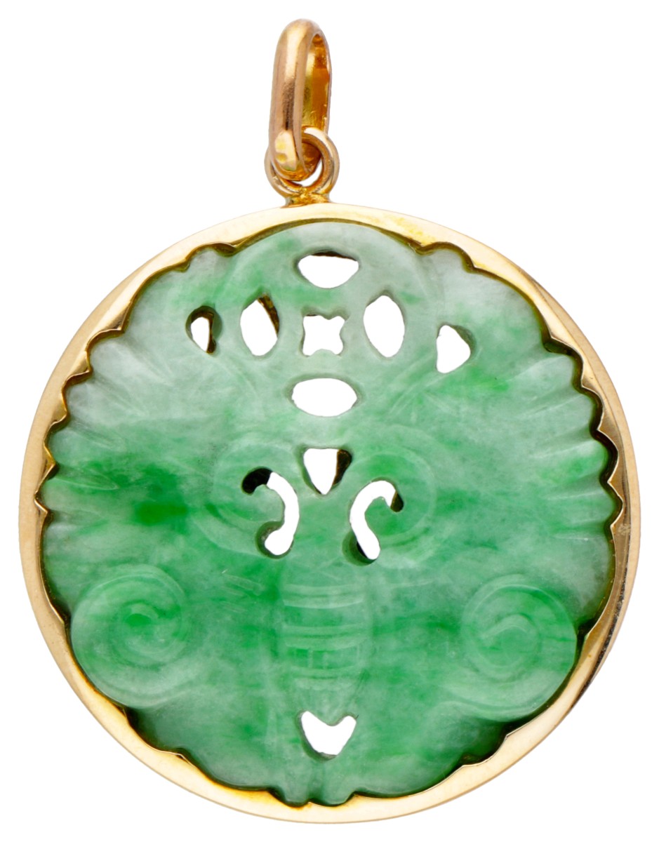 Vintage hanger van gesneden jade in een 14 kt. geelgouden montuur.