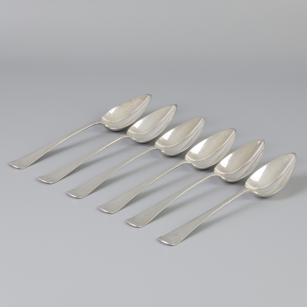 6-delige set dinerlepels "Haags lofje" zilver.