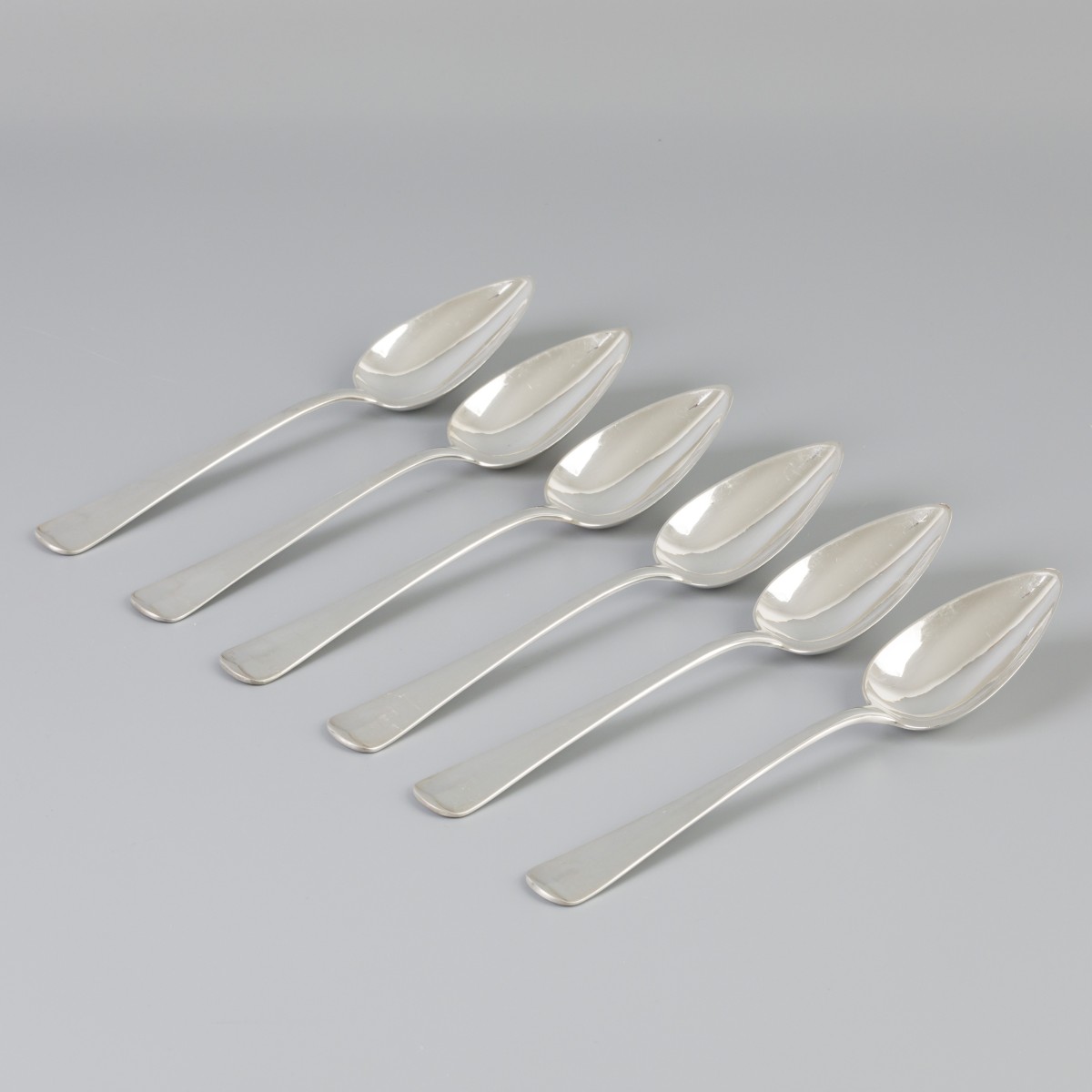 6-delige set dinerlepels "Haags lofje" zilver.