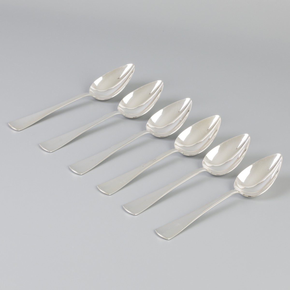 6-delige set dinerlepels "Haags Lofje" zilver.
