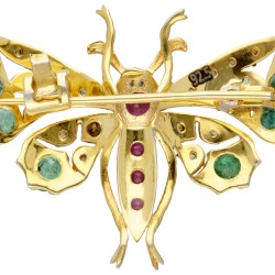 Vergulde sterling zilveren vlinderbroche bezet met diamant, smaragd, robijn en saffier.