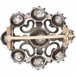 Geelgouden/zilveren broche, met ca. 0.92 ct. diamant - BWG.