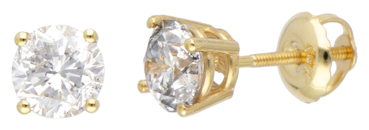 14 kt. Geelgouden solitair oorbellen bezet met ca. 1.10 ct. diamant.