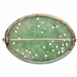 Zilveren broche, met floraal gesneden jade - 835/1000.