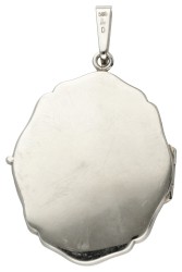 14 kt. Witgouden vintage medaillon hanger bezet met ca. 0.30 ct. diamant gezet op onyx.