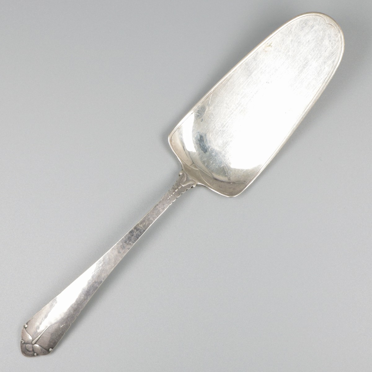 Taartschep zilver.