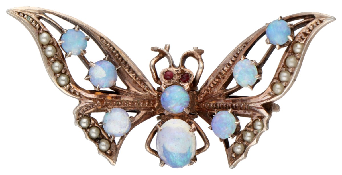 Vintage vergulde zilveren vlinderspeld bezet met opaal en zaadparels.