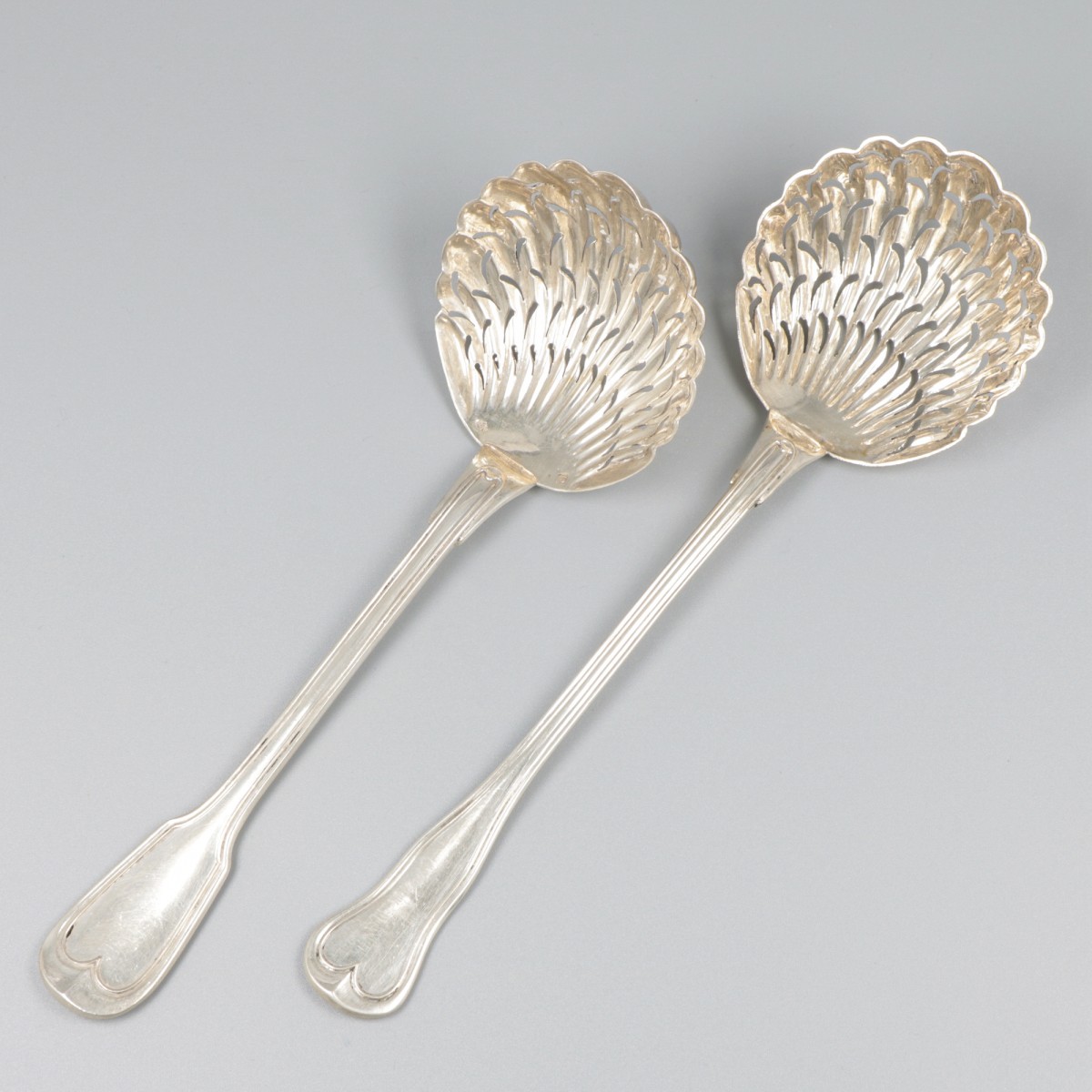 2-delig lot strooilepels zilver.
