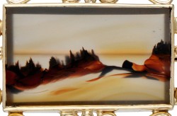 Vintage broche met landschapsagaat in een 14 kt. geelgouden montuur.