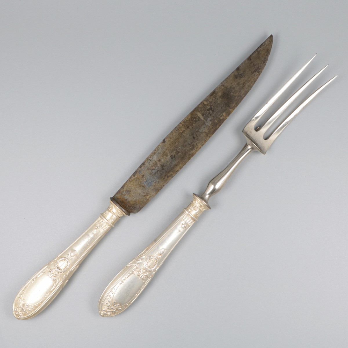 Trancheerset zilver.