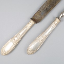 Trancheerset zilver.