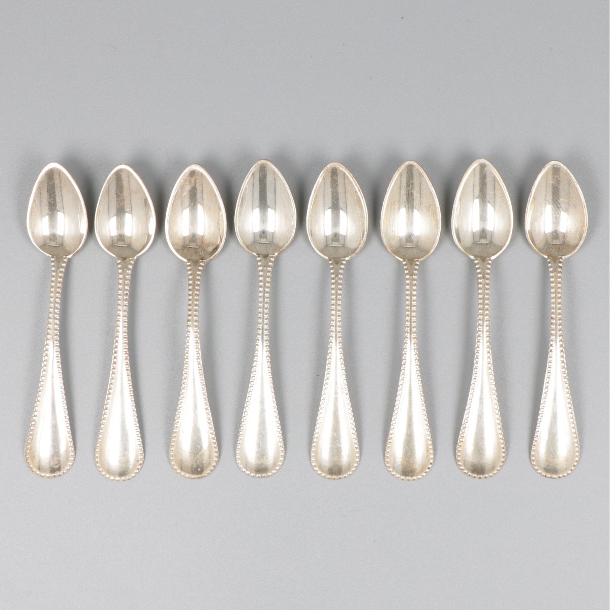 8-delige set mokkalepels zilver.