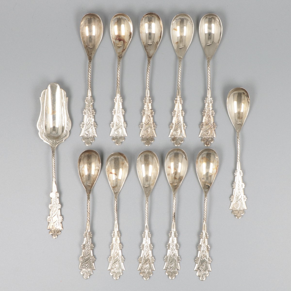 12-delige set koffielepels en suikerschep zilver.
