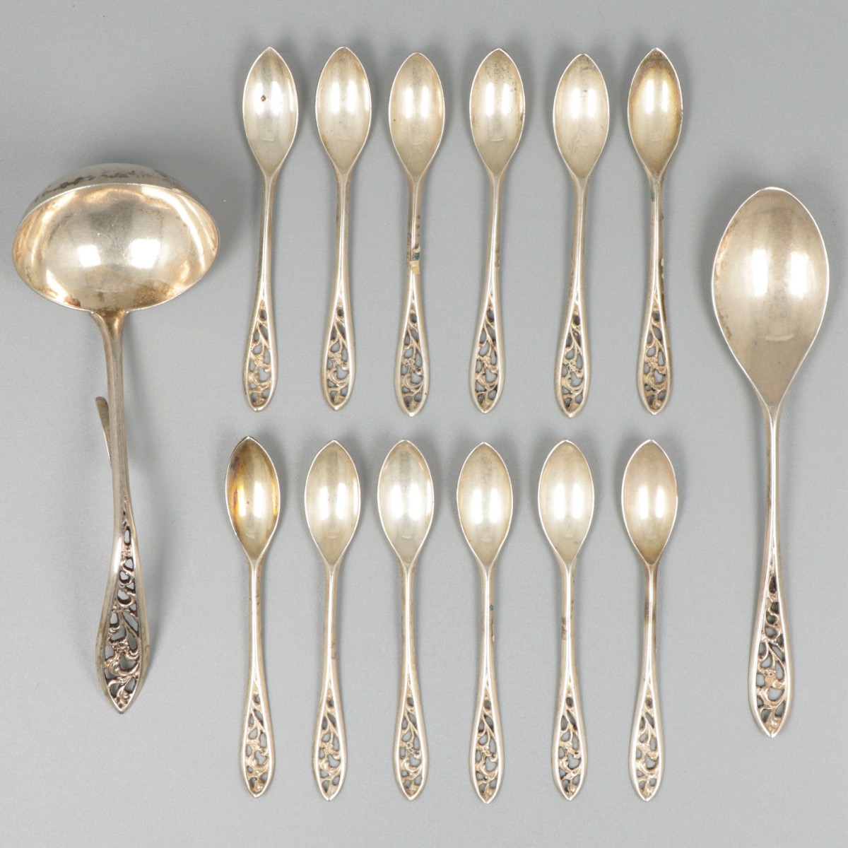 14-delige set mokkalepels, roomlepel en suikerschep zilver.