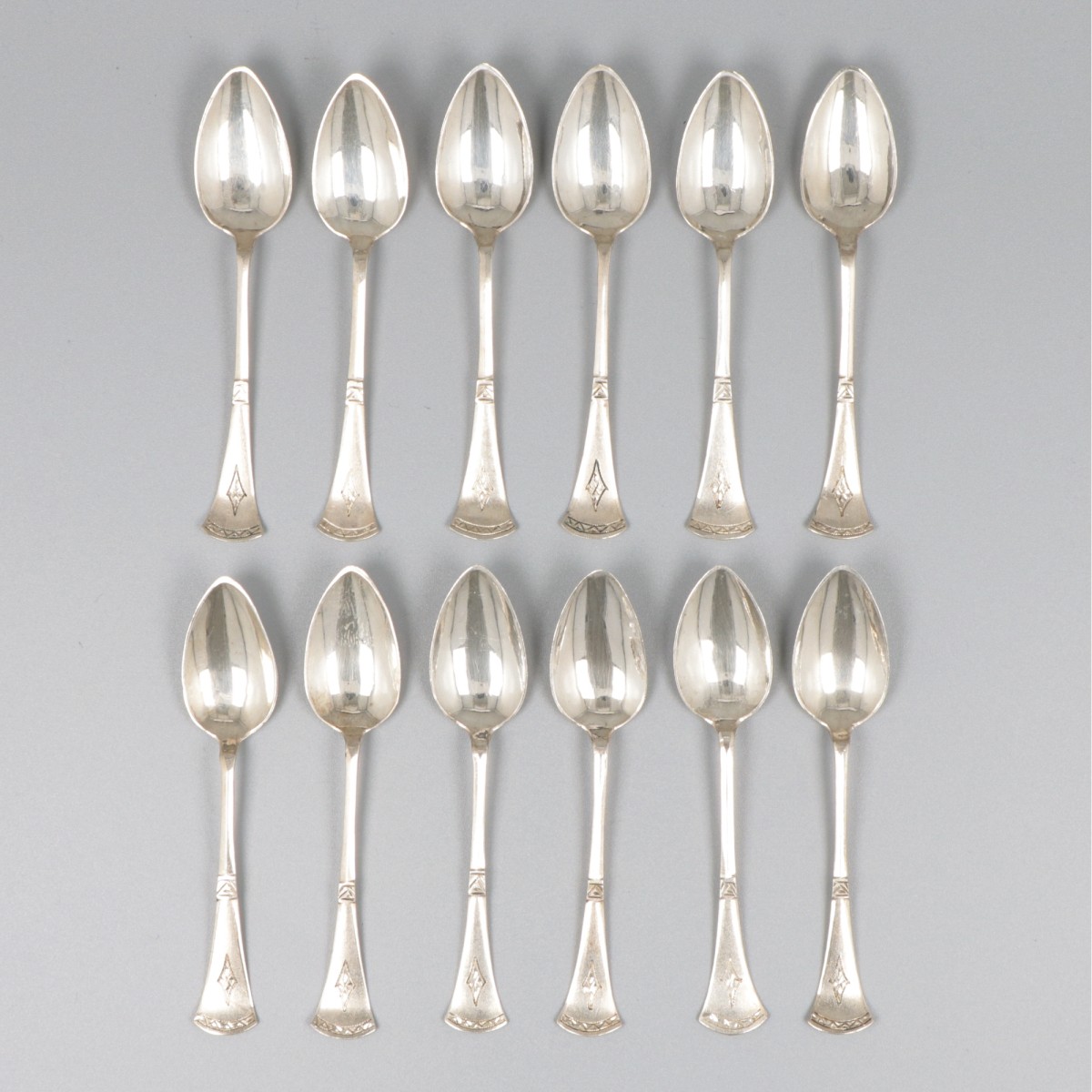 12-delige set koffielepels zilver.