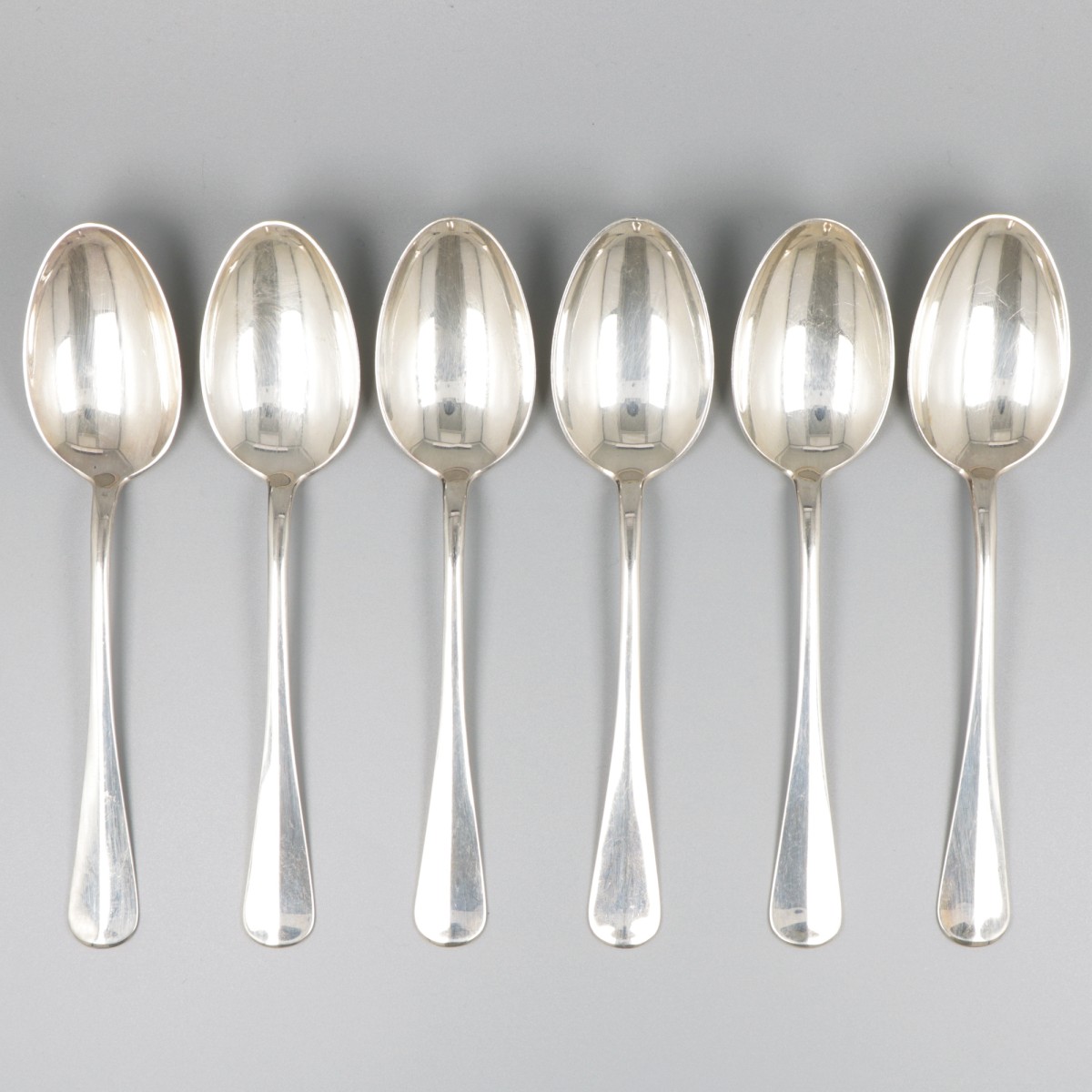 6-delige set dinerlepels zilver.