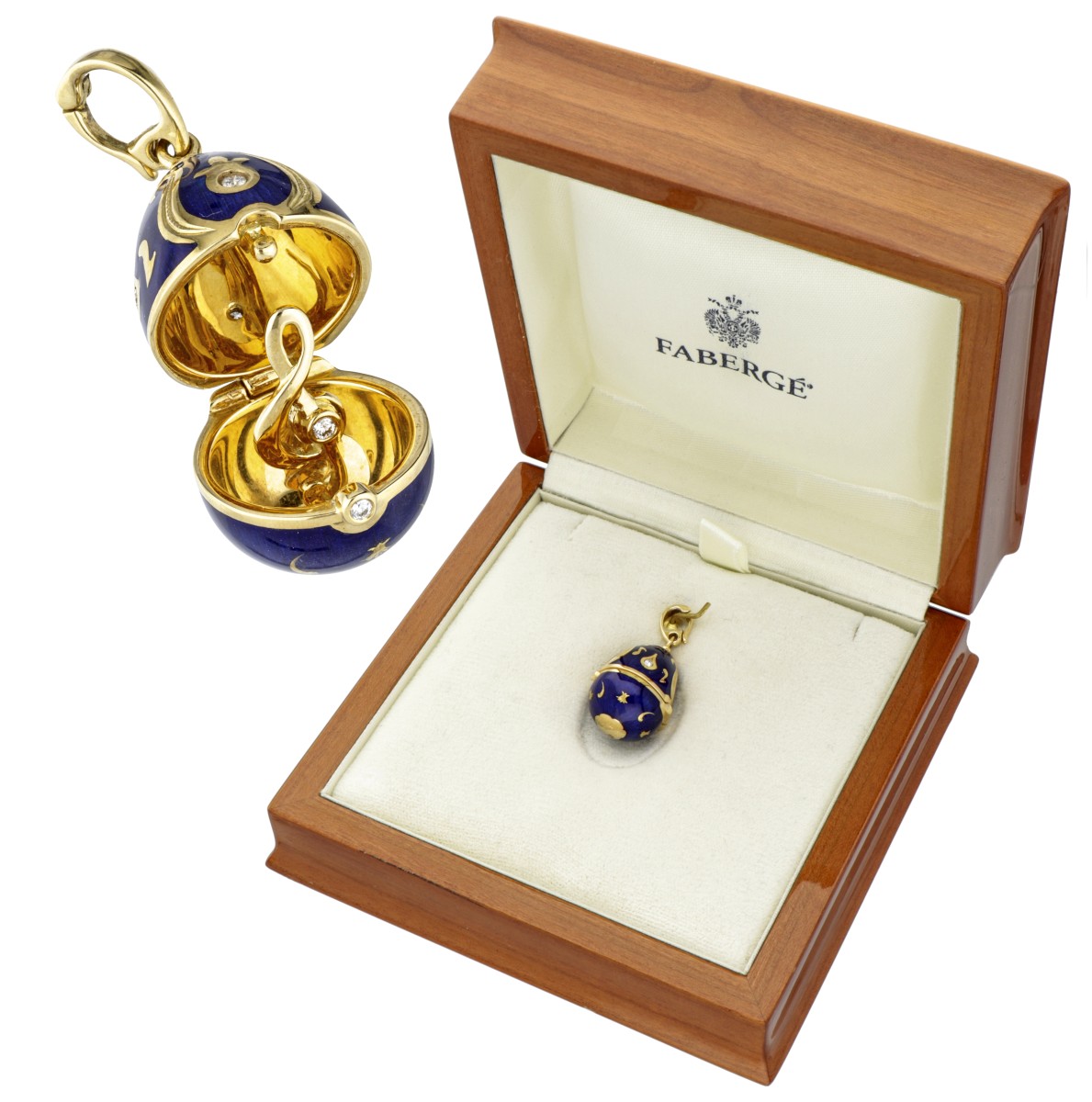 18 kt. Geelgouden Fabergé ei hanger met muzieknoot (gelimiteerde editie 139/300), bezet met diamant en blauwe emaille.