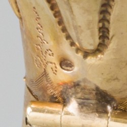 Parfumflacon goud.