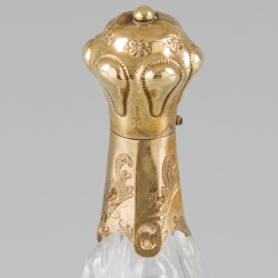 Parfumflacon goud.