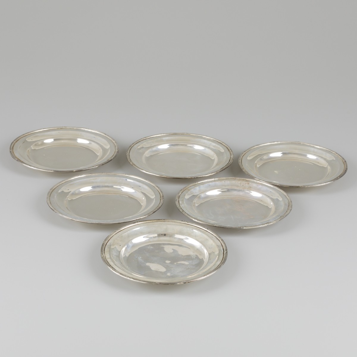 6-delige set bordjes zilver.