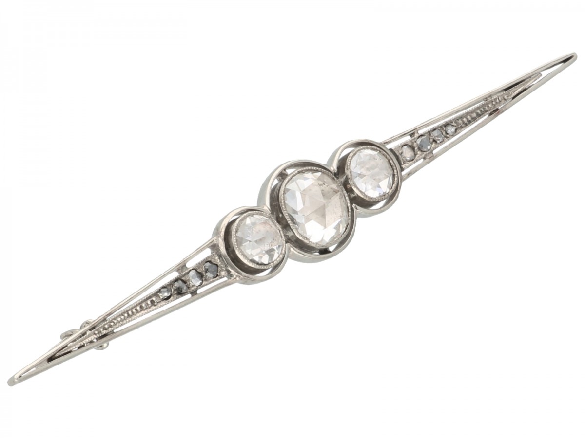 Witgouden Art Deco broche, met 11 diamanten - 14 kt.