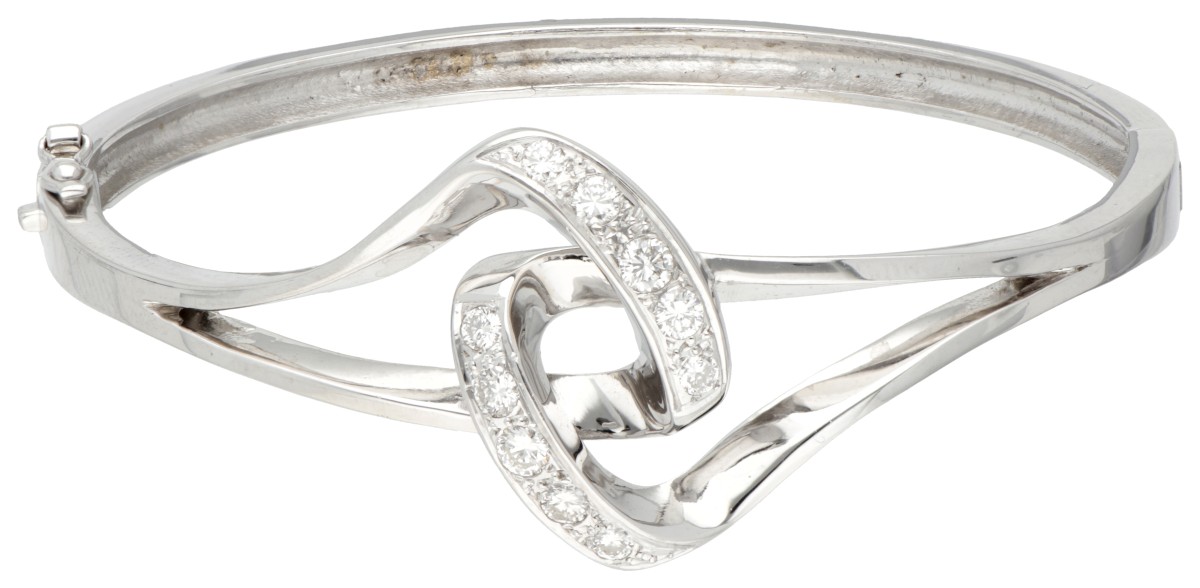 18 kt. Witgouden bangle armband bezet met ca. 0.45 ct. diamant.