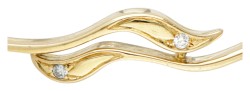 14 kt. Geelgouden bangle armband bezet met ca. 0.04 ct. diamant.