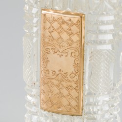 Parfumflacon goud.