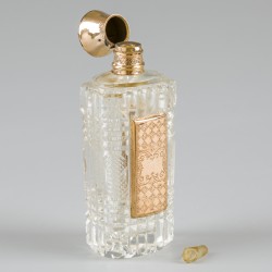 Parfumflacon goud.