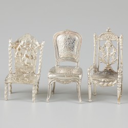 8-delig lot miniatuur stoelen zilver.